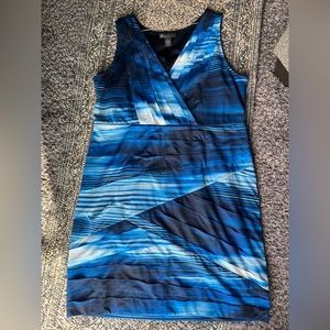 This blue and black dress with rouging will make you look beautiful.